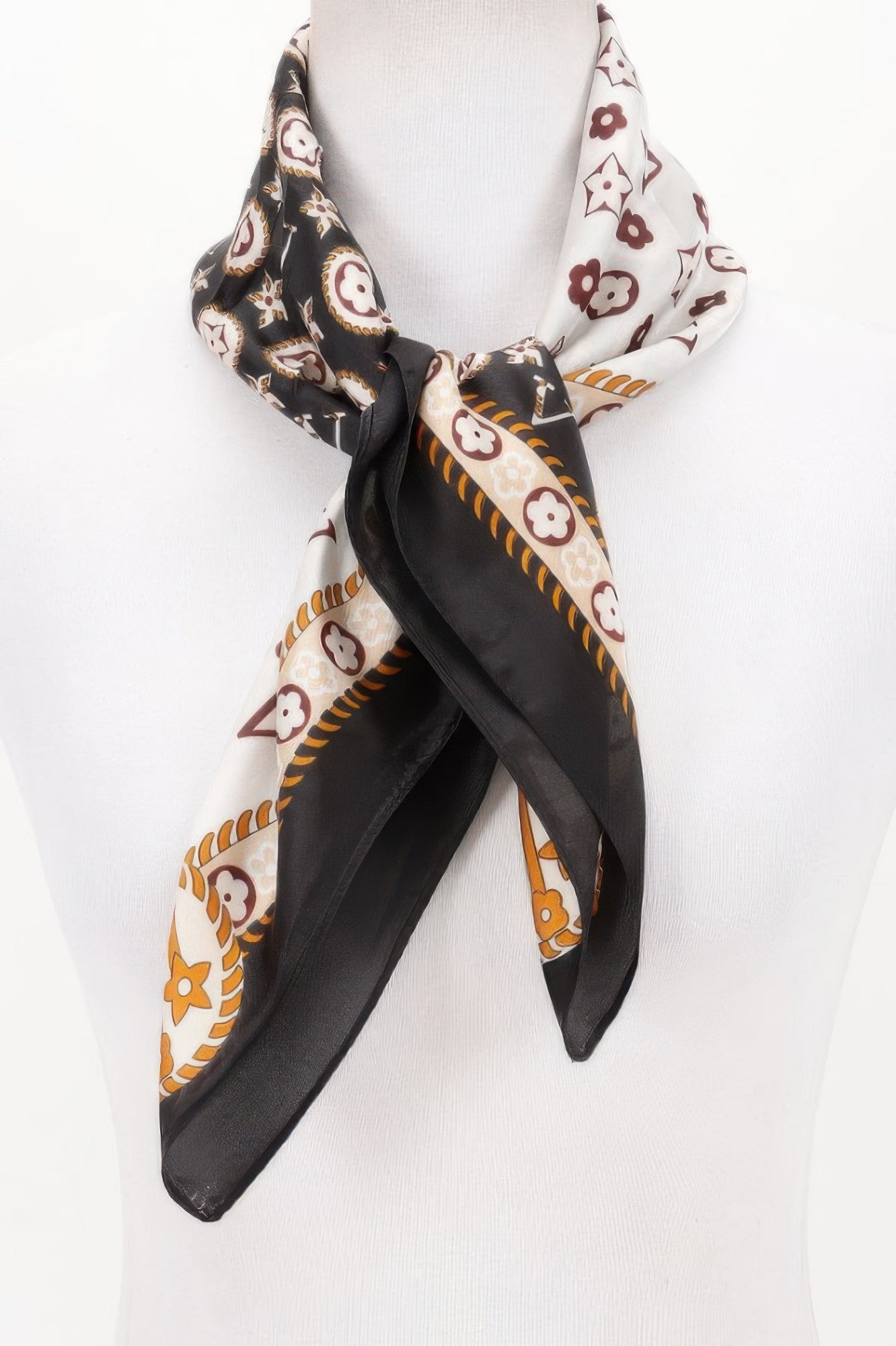 Multi Print Bandana tied around a white mannequin neck