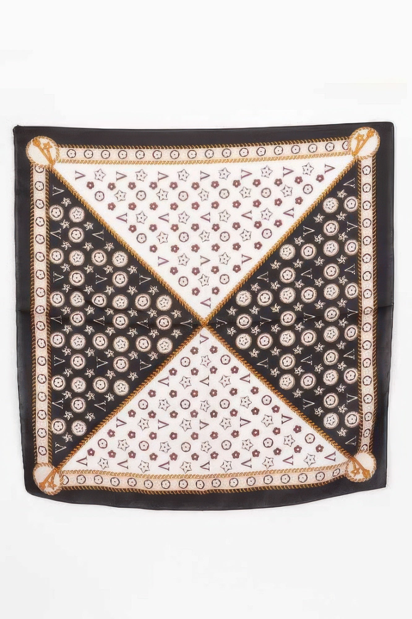 Multi Print Bandana with black and white quadrants, gold chain border, and various small patterns