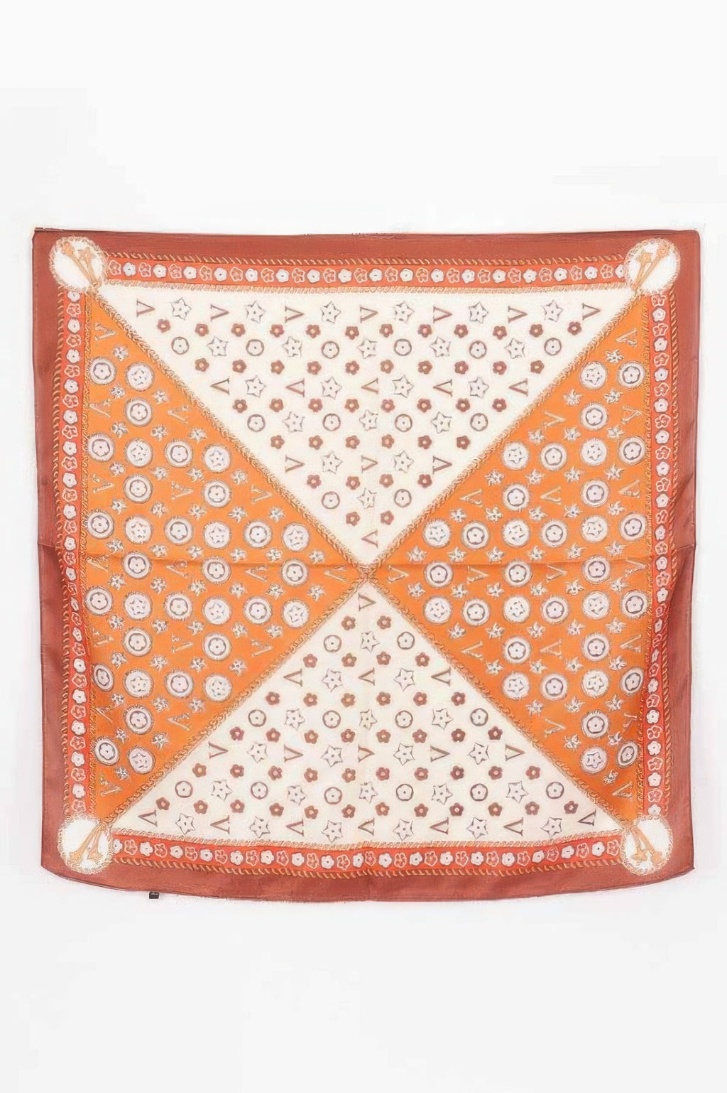 Multi Print Bandana with a brown border and a pattern of circles, stars, and V shapes