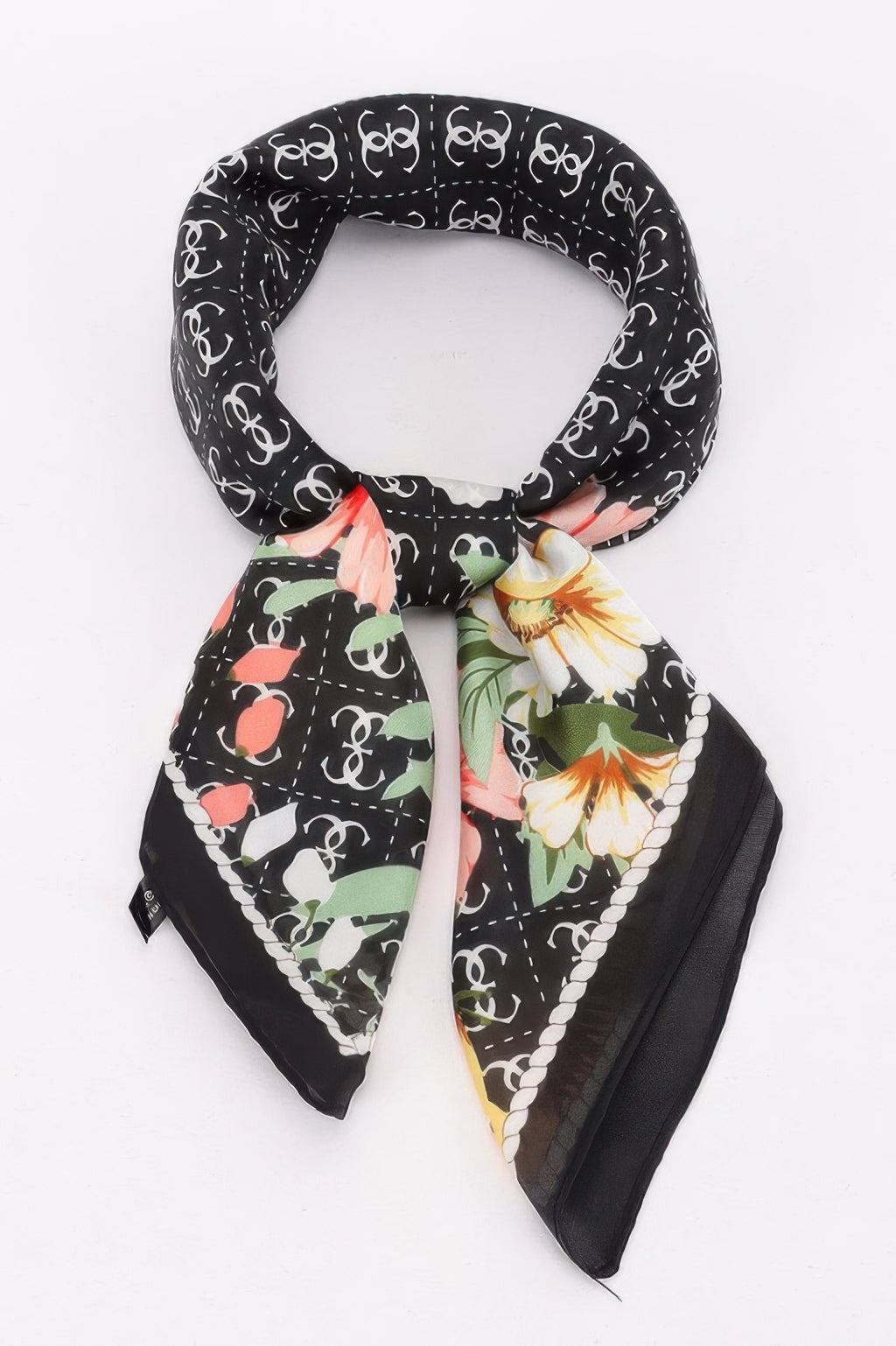 Multi Print Bandana with black background and white logo print, featuring a floral design