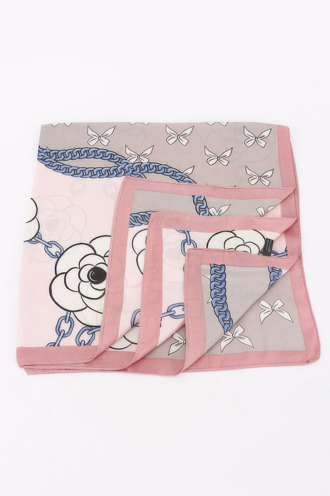 Multi Print Bandana with pink and grey panels, featuring white flowers, blue chains, and white bows