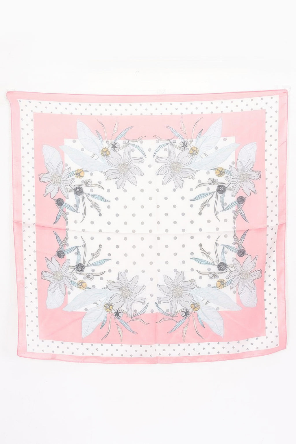 Multi Print Bandana with pink border, white center with grey polka dots, and floral designs