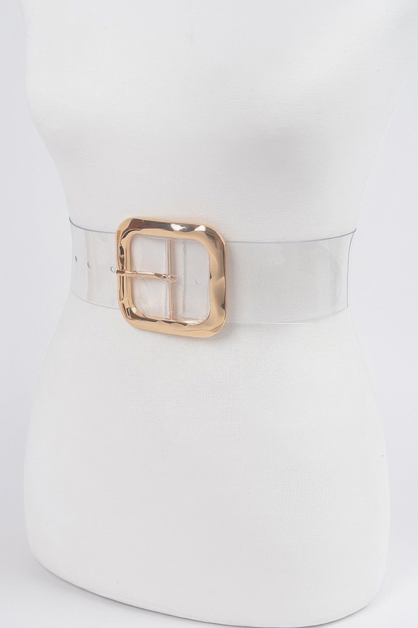 Transparent Metal Buckle Belt with a gold-colored, rectangular buckle on a white mannequin