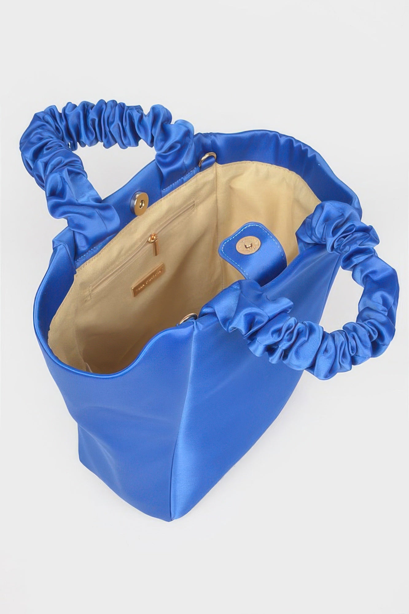 Satin Tote Bag with chain, open, showing the gold interior and magnetic closure
