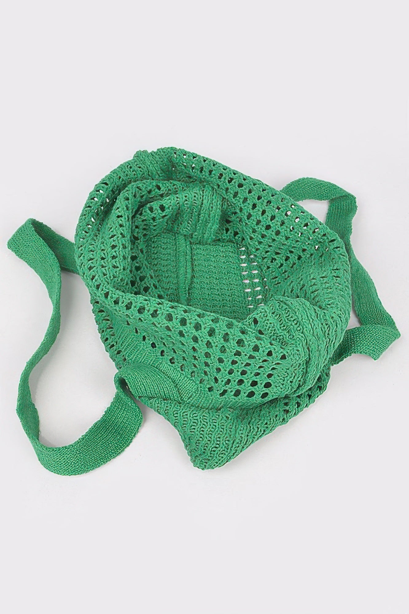 Knitted Tote Bag in green, made from a loose knit fabric with a solid bottom and handles