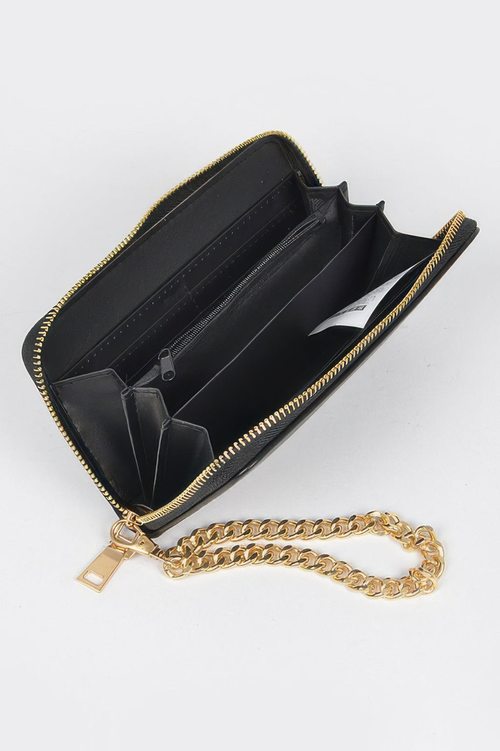 Open black studded wallet with gold chain, showing multiple compartments and a zippered section