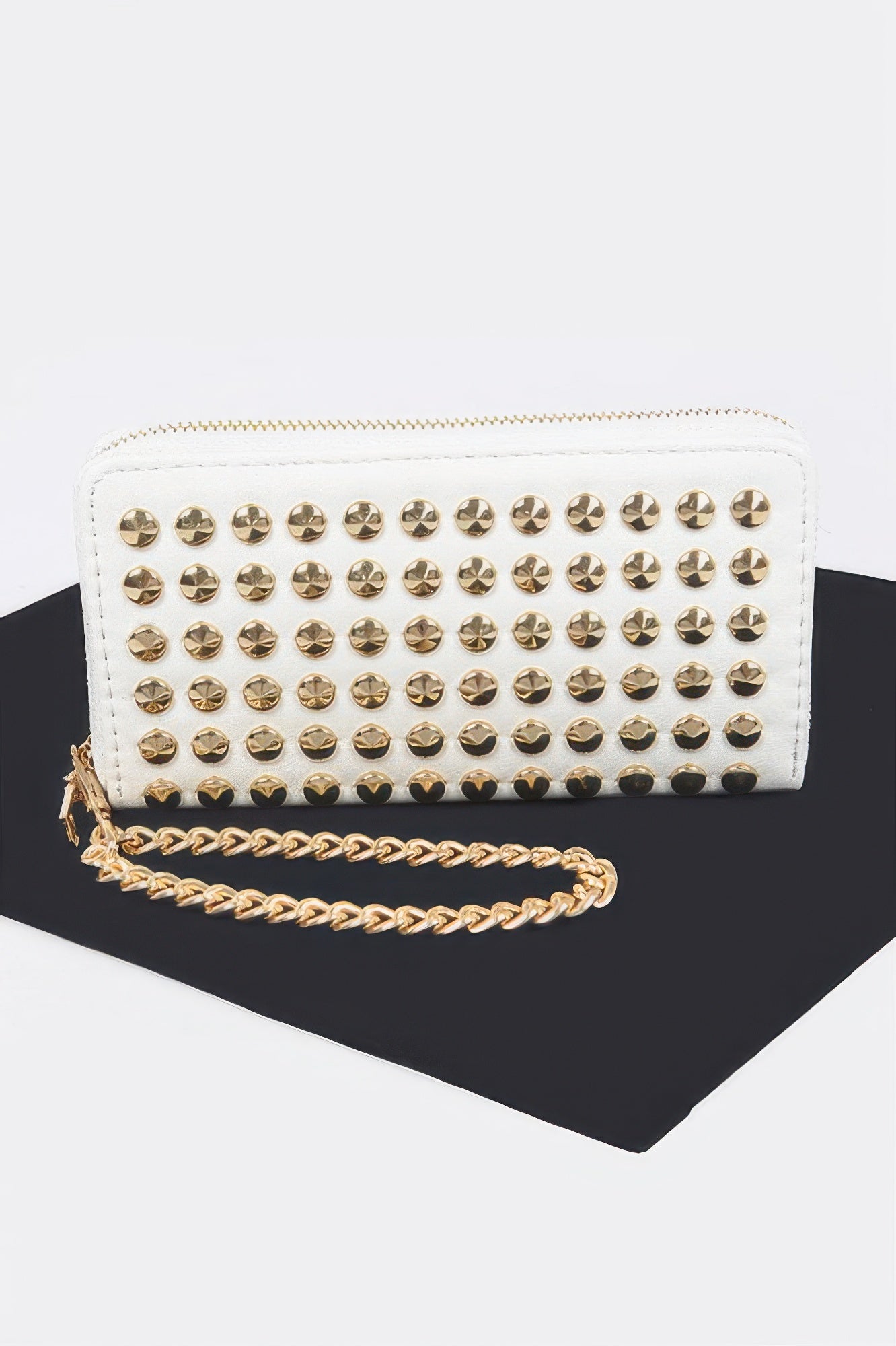 Studded Wallet With Chain in white with gold studs and a gold chain wristlet