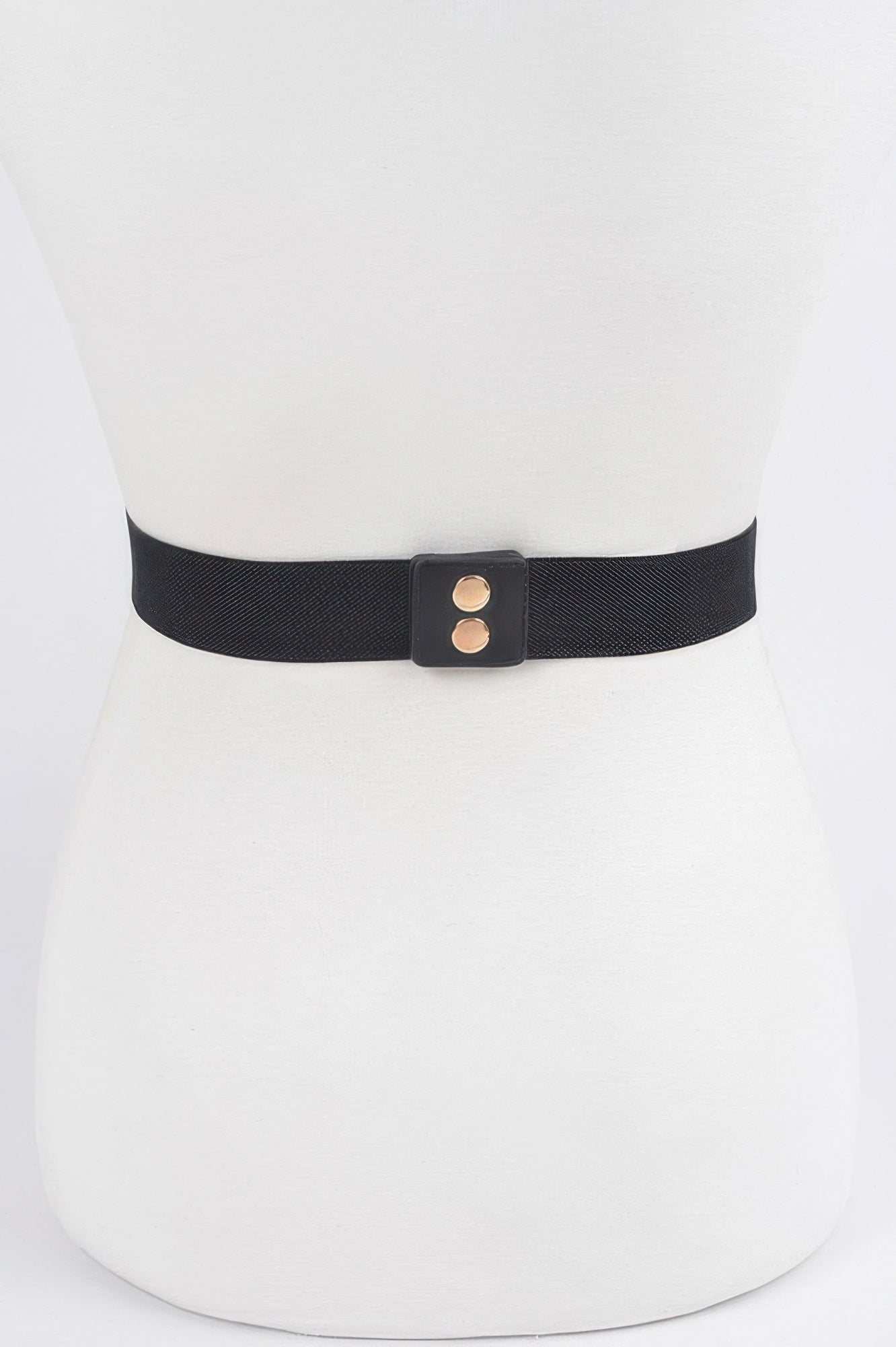 Multi Metal Stretch Belt in black with gold-colored metal accents on a mannequin