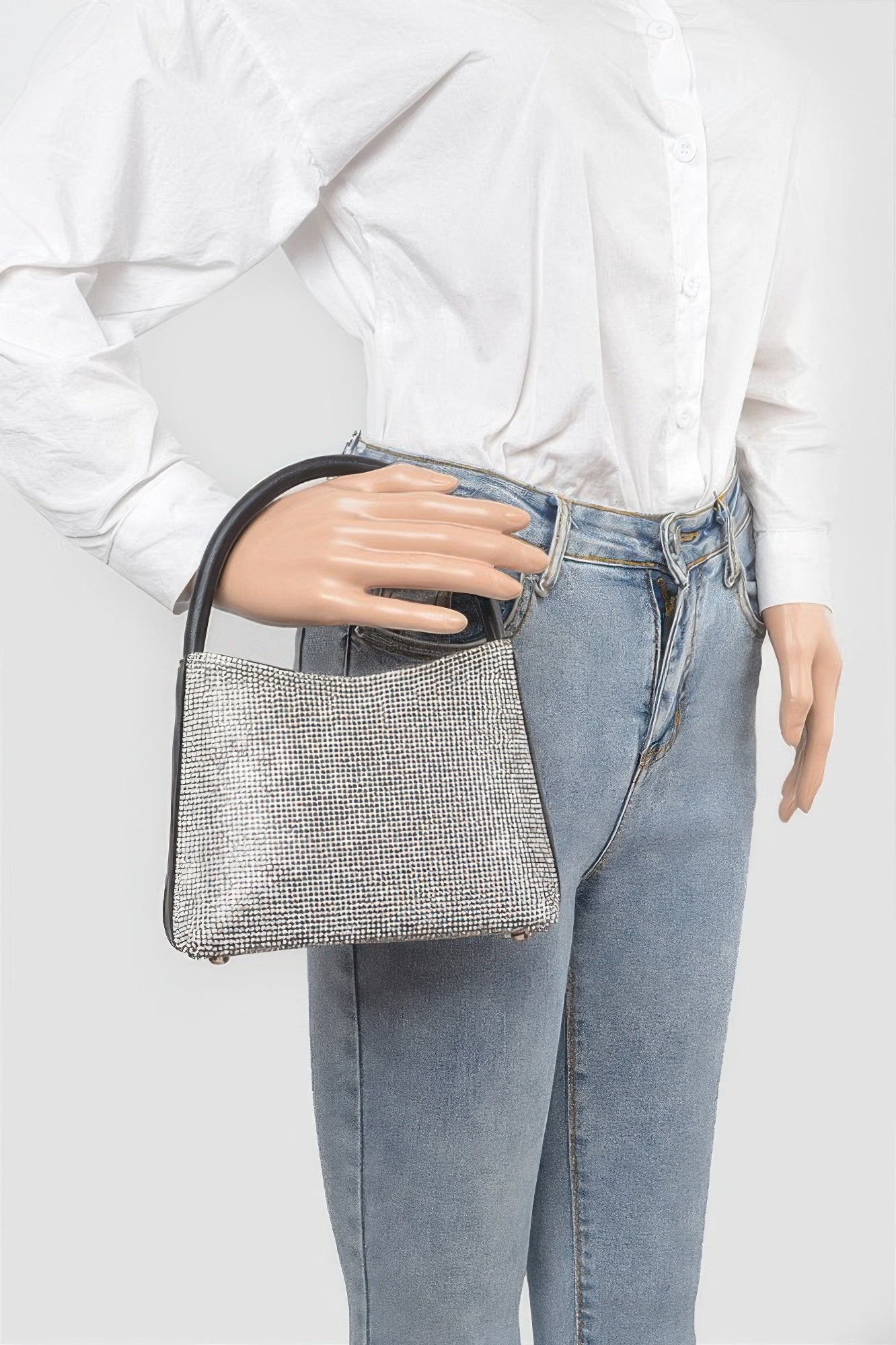 Rhinestone Top Handle Bag held by a mannequin wearing a white shirt and blue jeans