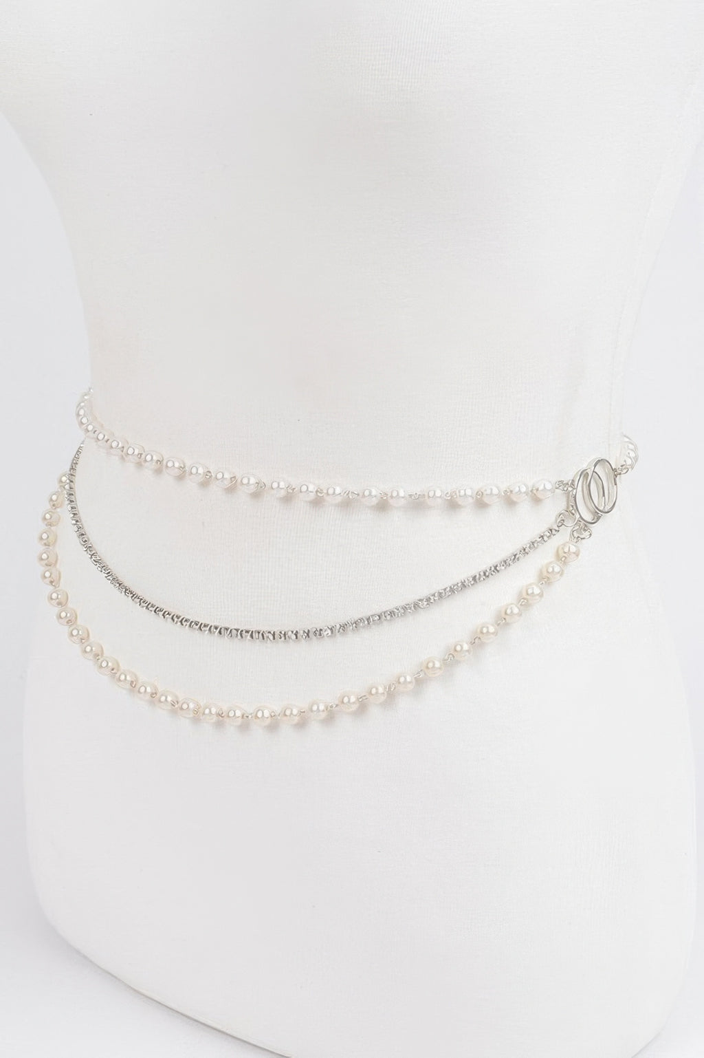 Pearl Layered Chain Belt with three strands, two with pearls and one with silver chain, on a white mannequin