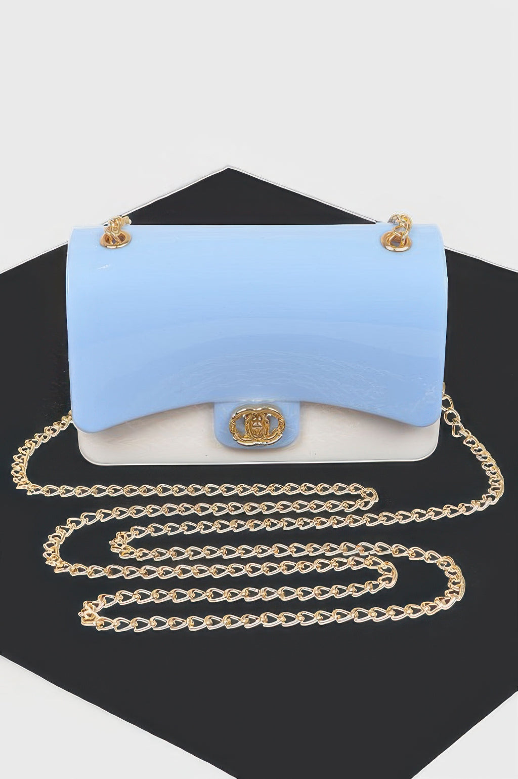 Two Toned Gold Metal Clutch in light blue and white with a gold chain strap and clasp