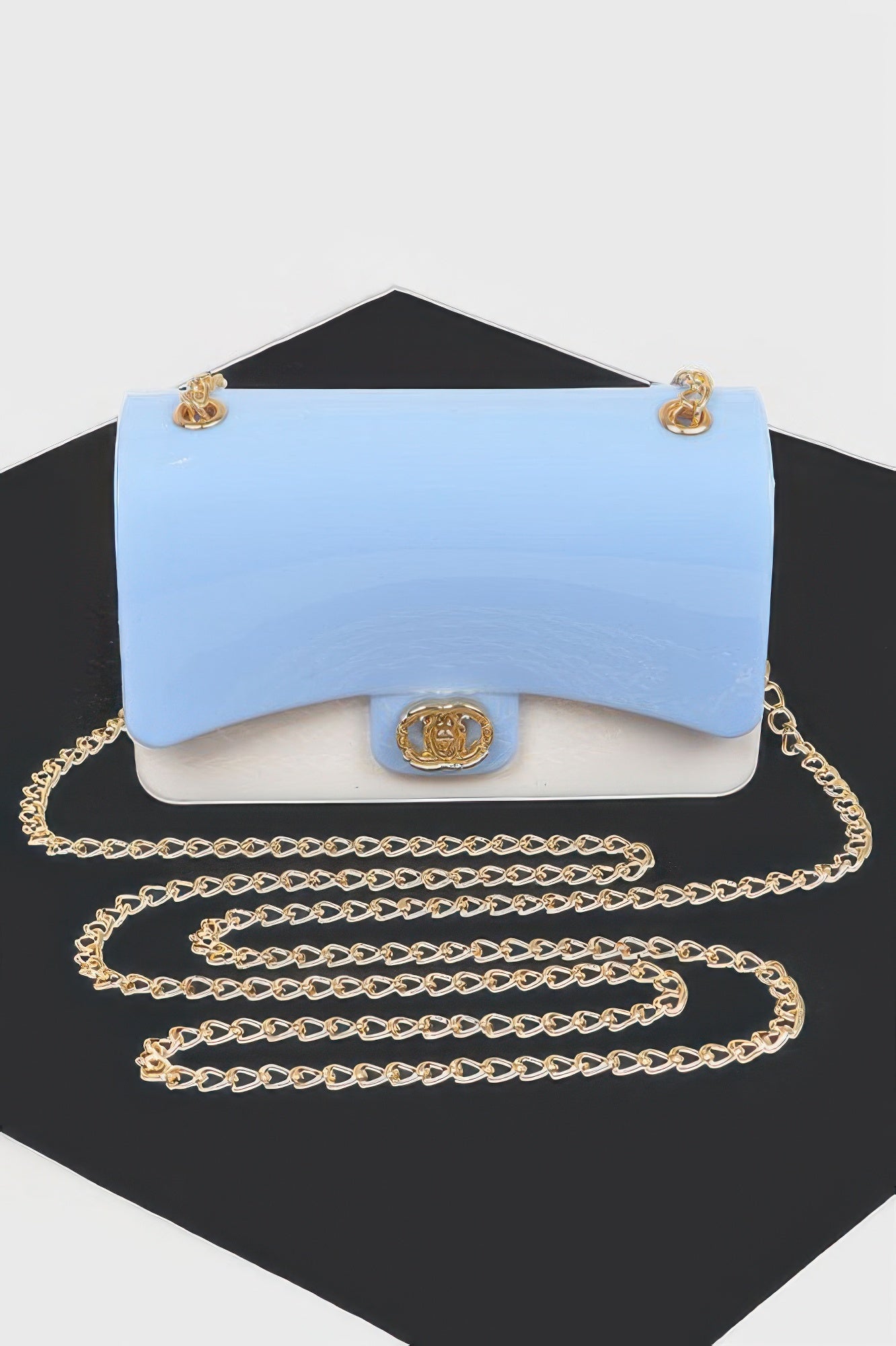 Two Toned Gold Metal Clutch in light blue and white with a gold chain strap and clasp
