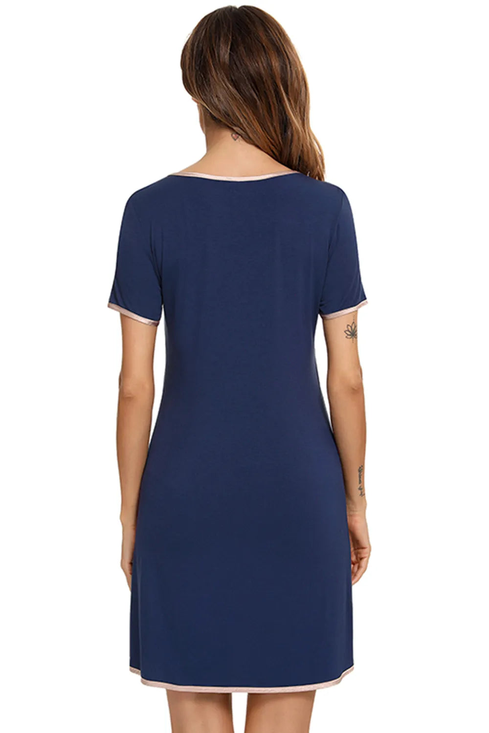 Back view of a woman wearing a navy blue Contrast Trim Pocketed Round Neck Lounge Dress