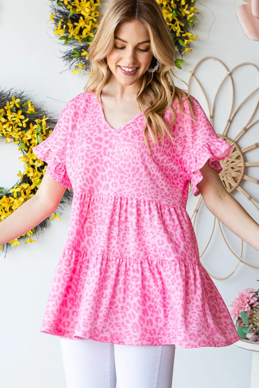 Leopard Ruffle Trim Short Sleeve Top in pink with leopard print, worn by a woman