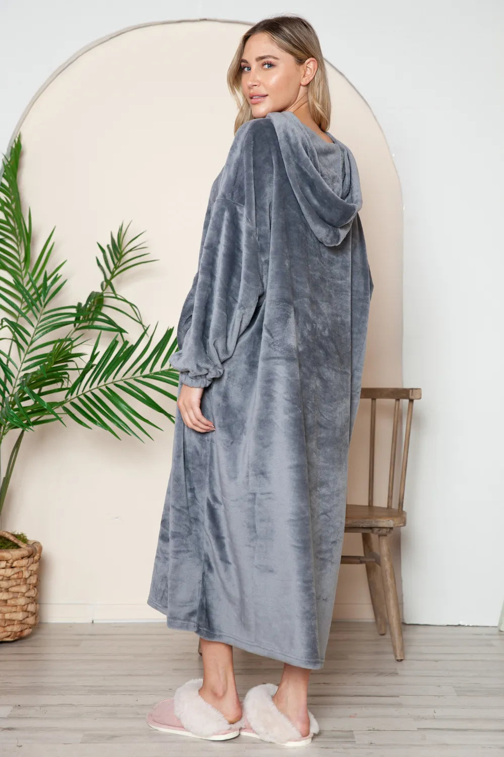 Double Take Full Size Pocketed Hooded Midi Lounge Dress in gray, worn by a woman facing away