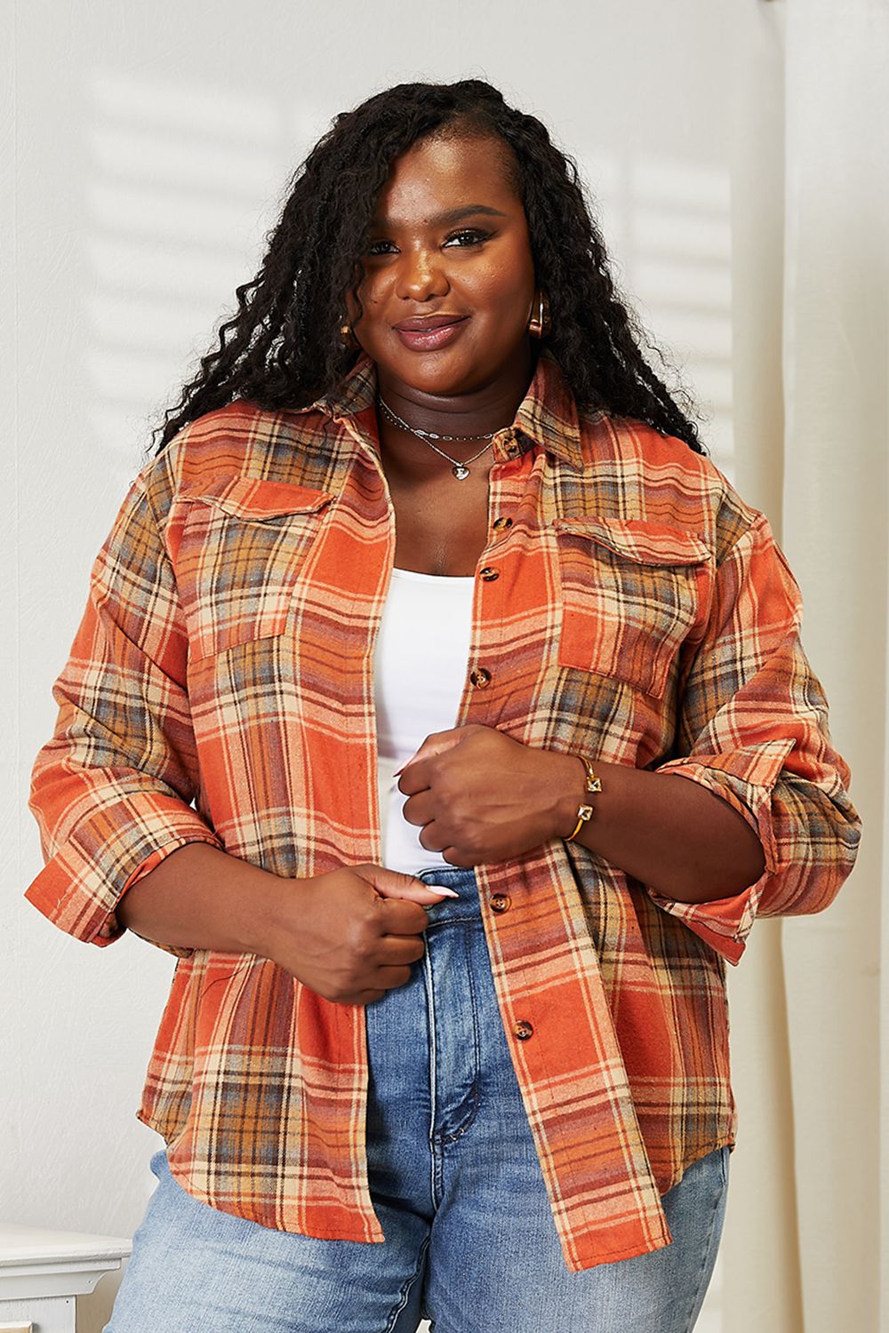 Plaid Button-Front Relaxed Shirt in orange, brown, and beige plaid, worn open over a white tank top