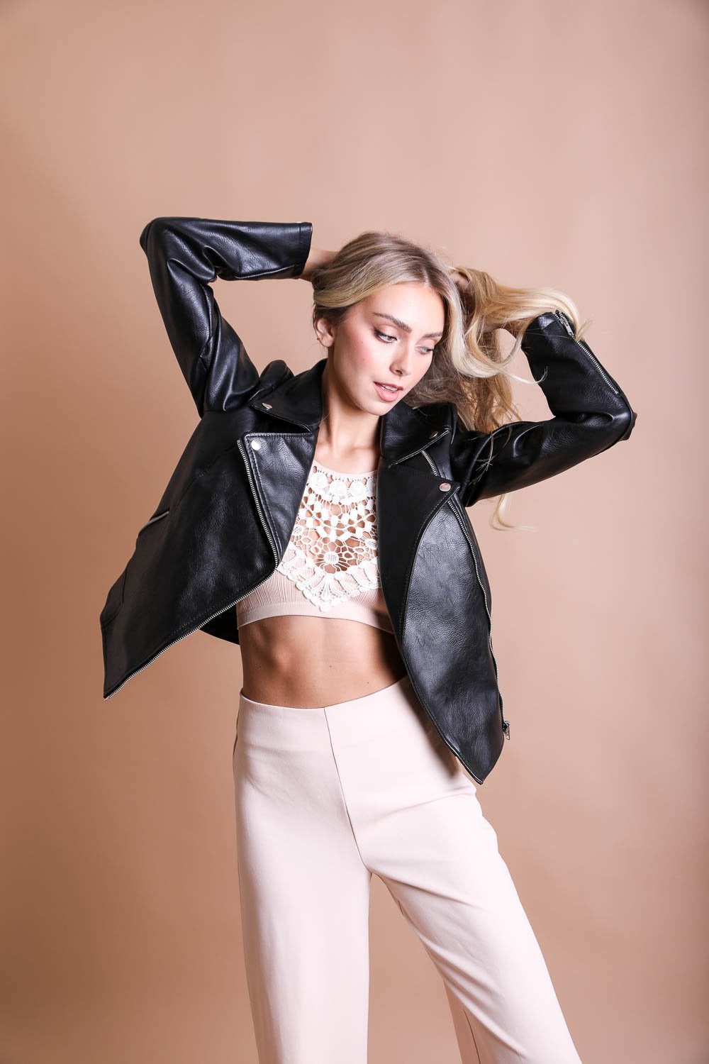 Crochet Lace High Neck Bralette with a black leather jacket and light pink pants
