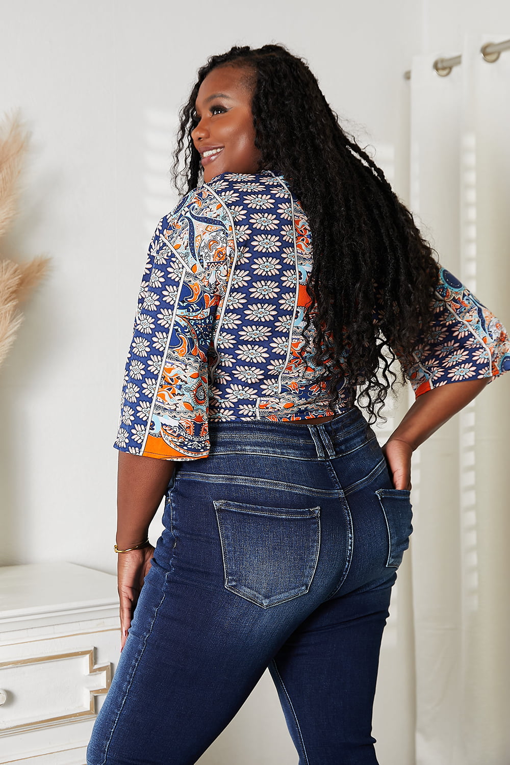 Tie Hem V-Neck Three-Quarter Sleeve Blouse in blue and orange print, paired with dark wash jeans