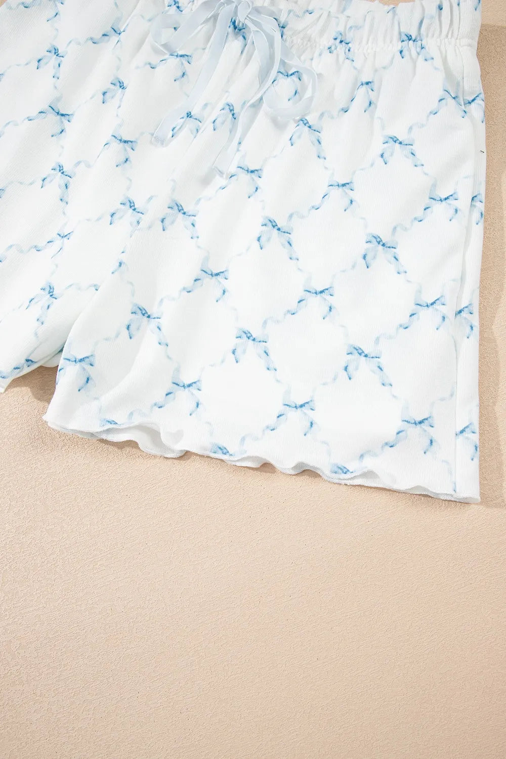 Printed Round Neck Top and Shorts Two-Piece Lounge Set with blue bow pattern