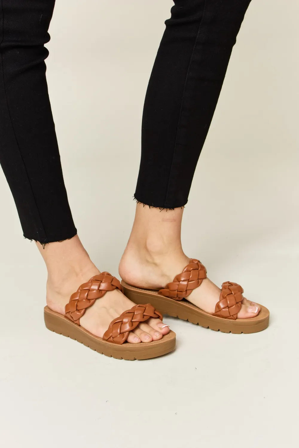 Woven Dual Band Platform Sandals in brown on a model
